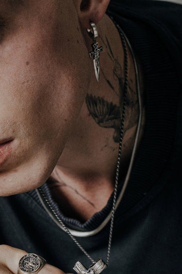 Back view of the Celtic Sword Earring displaying the polished hoop with the 925 hallmark and SARNION brand stamp