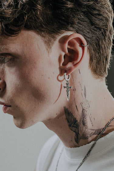 Celtic Sword Earring shown with a size reference to demonstrate its actual dimensions and drop length when worn