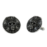 Close-up detail of a single Aztec Warrior sterling silver cufflink, focusing on the ornate skull, intricate headdress, and surrounding patterns.