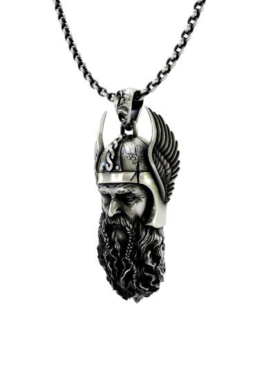 Close-up detail of the wise, one-eyed expression on the Norse Allfather Pendant, showing the fine craftsmanship.