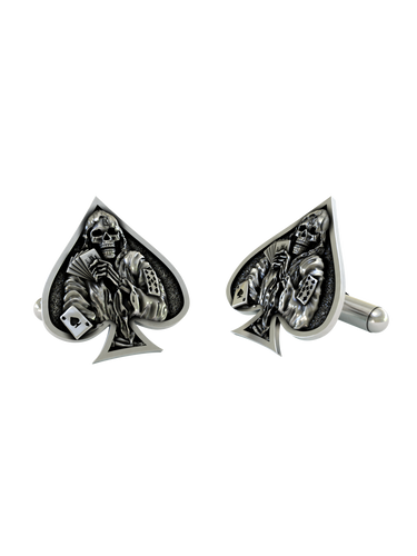 Front and side profile of the Death Ace sterling silver cufflinks, highlighting the 3D relief of the skeleton holding playing cards.