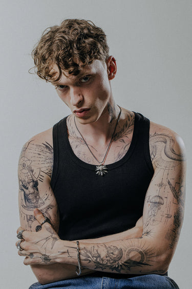 Witcher Wolf Medallion in 925 sterling silver worn as the ultimate piece of fan jewelry for The Witcher saga.