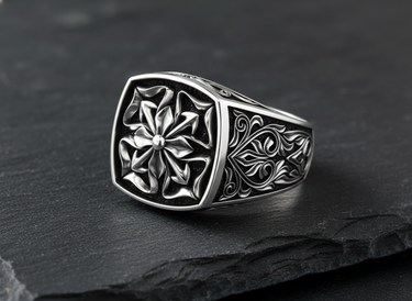 Side profile of a handcrafted 925 sterling silver Maltese Cross ring displaying the ornate filigree detail on the shank.