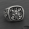 Front view of the sterling silver Maltese Cross ring, showcasing the intricate oxidized details of the central cross on its cushion face.