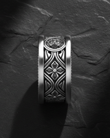 Side view of handcrafted lion head ring showing detailed medallion and intricate metalwork design