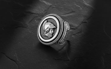 Side angle view of handcrafted Roman soldier ring showing decorative column details and oxidized silver finish