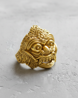 Detailed men's silver demon mask ring, close-up view of the fierce fanged mouth, bulging eyes, and intricate carvings.
