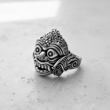 Handcrafted 925 sterling silver Balinese ring, angled side view highlighting the swirling patterns and oxidized finish.