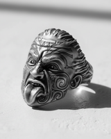 Side view of the Silver Maori Warrior Ring showcasing the oxidized finish on the intricate Tā moko style patterns.