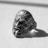 Side view of the Silver Maori Warrior Ring in 925 sterling silver, showing the fierce Haka expression and detailed hair texture.