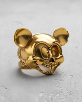 Gold-plated Cartoon Skull Ring showcasing the high-polish finish and detailed skull half on a light gray background.