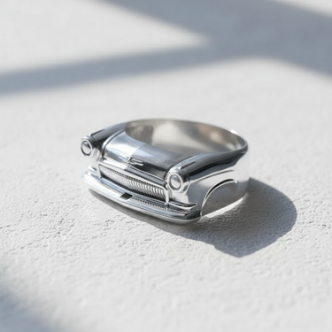 Front view of 925 sterling silver classic car ring featuring detailed grille and headlights on white surface