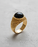 Detailed side view of basketweave pattern ring design showing high quality metalwork and domed stone profile