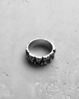 Top-down view of the Silver Rock Texture Ring highlighting the contrast between its smooth polished interior and rugged uneven exterior.