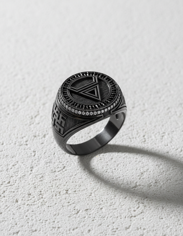 Men's geometric silver ring with a black rhodium finish, featuring an inverted triangle and a border of pave-set stones.