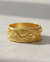 14K gold vermeil Silver Wave Grid Ring with ornate flowing patterns over a geometric background, shown in bright sunlight.