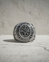 Front view of the sterling silver Air Force Academy ring with a dark gemstone, showcasing the detailed crest and lettering.