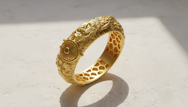 14K gold vermeil Dragon Phoenix Ring with intricate dragon carving and prosperity symbol on a textured white surface.