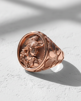 Rose gold plated silver rooster ring featuring an intricate warrior cameo with a rooster helmet and sunburst detail.