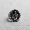 Top-down view of the sterling silver Sacred Heart Jesus ring, showing the detailed oval face and notched border.