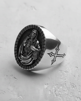 Angled side view of the men's Sacred Heart Jesus ring, highlighting the engraved cross symbol on the 925 silver band.