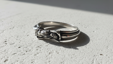 Side view of the Silver Goddess Ring in an oxidized 925 sterling silver finish, highlighting the intricate sculptural details.