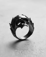 Black rhodium plated Silver Laurel Skull Ring shown at a three-quarter angle, highlighting the dark, polished finish.