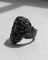 Silver Jesus Ring in a dark black rhodium finish, side profile view highlighting the detailed hair and beard.