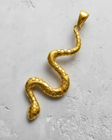 Gold-plated version of the serpentine snake pendant, showcasing the hexagonal scales with a bright, polished finish.