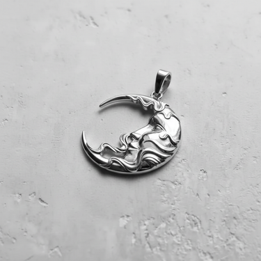 925 sterling silver moon face pendant featuring a sleeping profile and flowing hair design