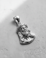 925 sterling silver Jesus head pendant featuring detailed crown of thorns and flowing hair design on textured background