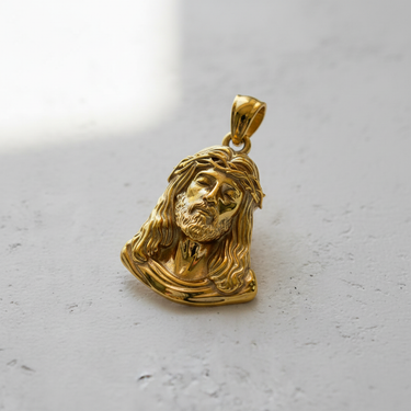 14K gold vermeil Jesus head pendant featuring detailed crown of thorns and textured beard on white background