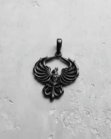 Black rhodium plated silver phoenix pendant with symmetrical wings and ornate tail feathers on white background