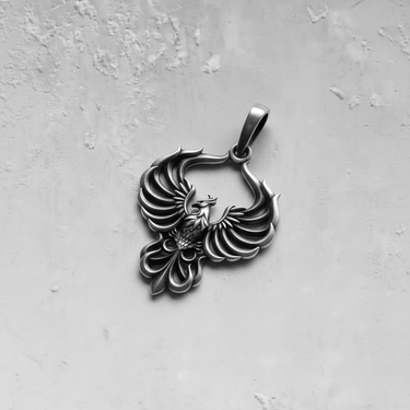 Angled view of mythical phoenix bird pendant design handcrafted in premium sterling silver