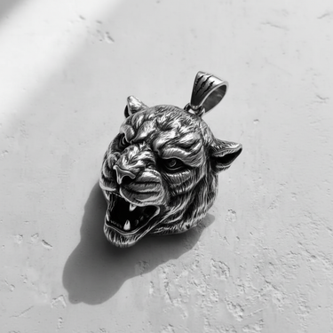 Three-quarter angle of the 925 sterling silver tiger pendant highlighting the 3D craftsmanship and fierce expression.
