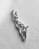 Highly polished 925 sterling silver horse pendant, showing its brilliant shine and intricate facial details from a top-down view.