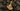 Detailed view of gold variant Axe of Perun pendant displaying intricate segmented blade and protective Viking rune
