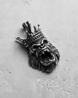 Angled view of the Silver King Gorilla Pendant, highlighting the intricate fur texture and sharp teeth in 925 silver.