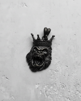 Dark oxidized finish on the Silver King Gorilla Pendant, emphasizing the deep shadows of the angry expression and crown.
