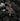 Rose gold plated 925 sterling silver snake pendant with detailed scales on dark background