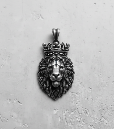 Front view of the Silver Lion Pendant with an ornate crown, showing the detailed facial features and mane in oxidized 925 silver.