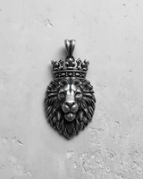 Oxidized 925 sterling silver crowned lion pendant with a detailed frontal view showcasing the majestic face and mane.
