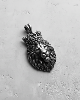 Close-up of the regal King Lion Head Pendant in 925 sterling silver, detailing the intricate metalwork on the crown and face.