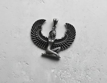 Top-down view of the Egyptian Isis Pendant in sterling silver, highlighting the symmetrical design and craftsmanship of the wings.