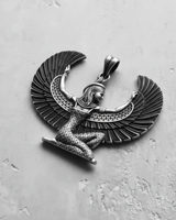 Close-up of kneeling Egyptian goddess pendant crafted in sterling silver highlighting intricate wing feathers and bail loop