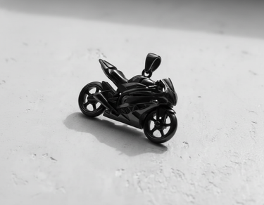 Black rhodium plated sterling silver sport bike pendant side view on white background