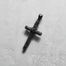 Oxidized 925 sterling silver cross pendant featuring rope wrap detail and rough timber design