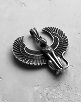 Angled view of the sterling silver Bastet pendant, highlighting the detailed feather texture on the wings and side profile.