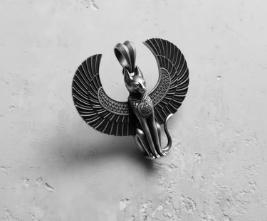 Close-up of the winged Bastet cat pendant in sterling silver, focusing on the intricate headdress and facial details of the cat.