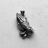 Top-down view of a 925 sterling silver praying hands pendant with an oxidized finish highlighting the intricate details.